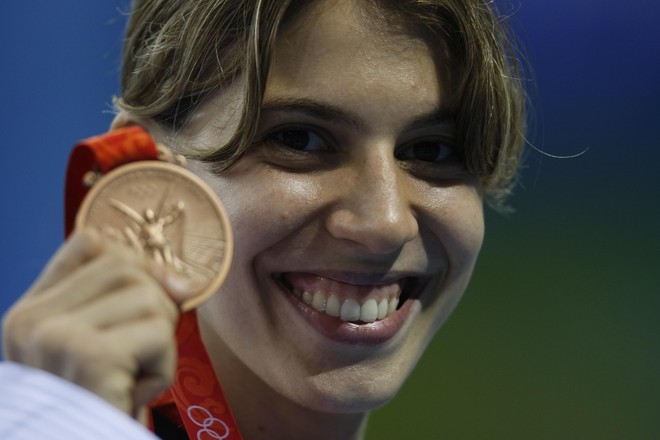 O orgulho pela medalha que já havia lhe escapado antes estava estampado no rosto da paranaense |