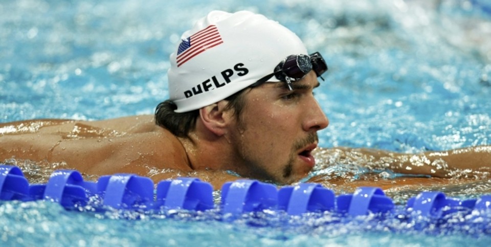 Em Pequim, Michael Phelps nadará para superar a marca de sete medalhas de ouro pertencente a Mark Spitz | SERGIO MORAES/REUTERS