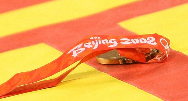 ... Antes de abandonar a medalha de bronze, agora cassada pelo COI | 