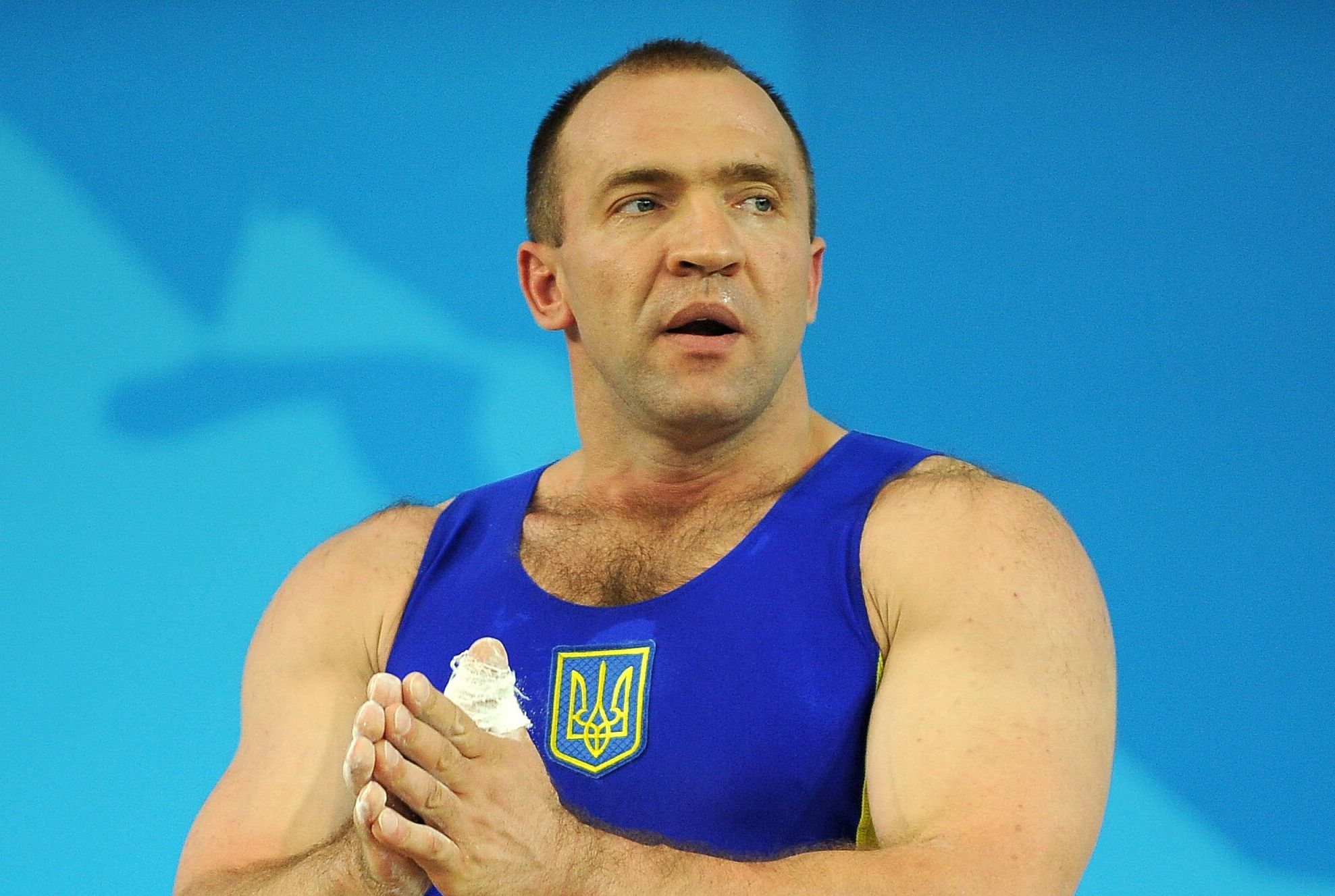 Igor Razoronov 6° colocado no levantamento de peso. Substância econtrada no exame não foram reveladas | AFP PHOTO/ JUNG YEON-JE