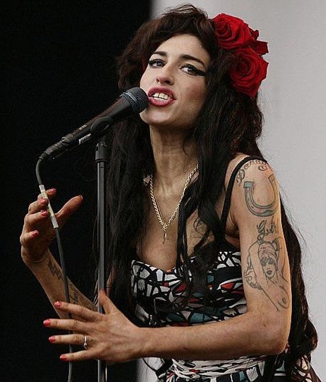 No dia seguinte, Amy subiu ao palco lúcida e com boa aparência - mas isso não durou | 