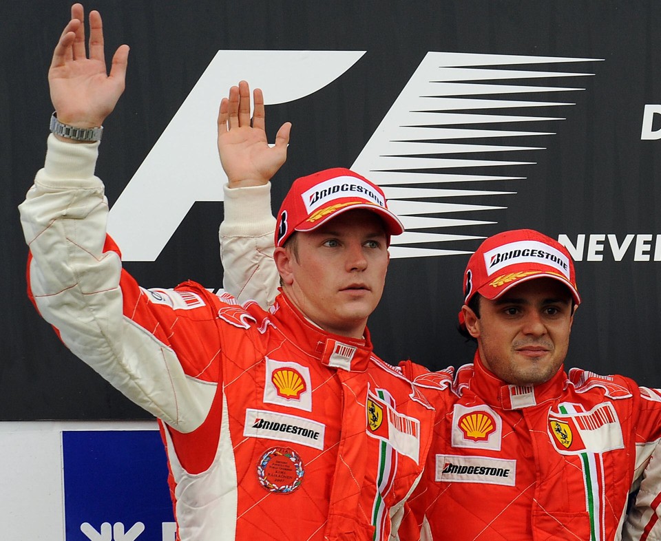 No próximo ano, Kimi Raikkonen e Felipe Massa farão dupla na Ferrari pela terceira temporada seguida | Bertrand Guay / AFP