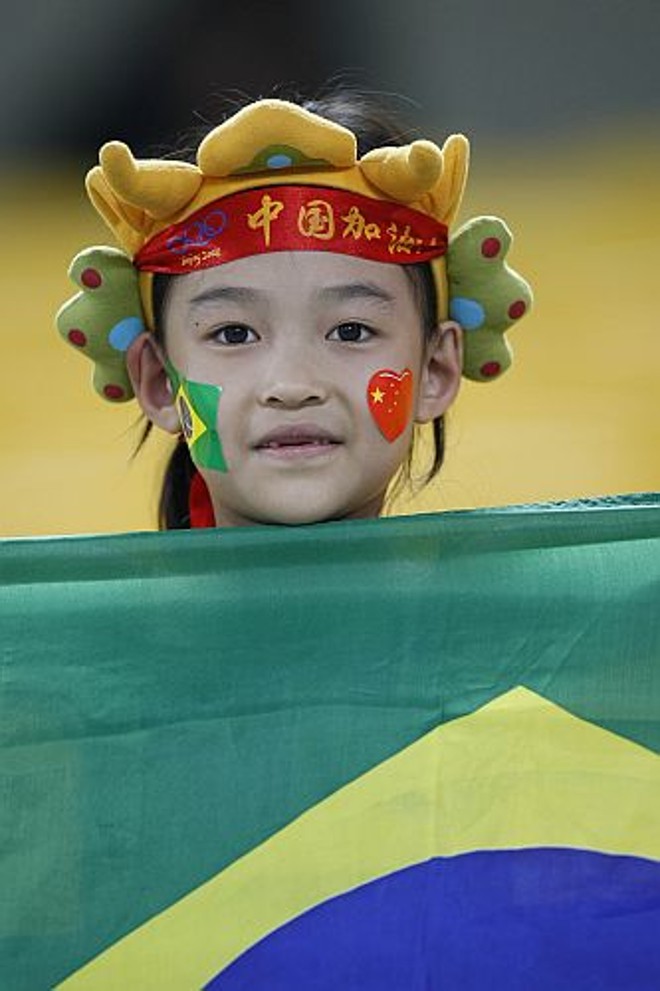 Chineses entraram no clima de torcida |