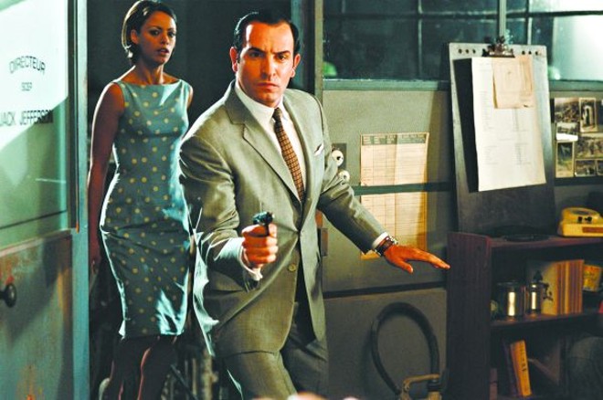 Bérénice Bejo e Jean Dujardin em cena do longa francês Agente 117 |