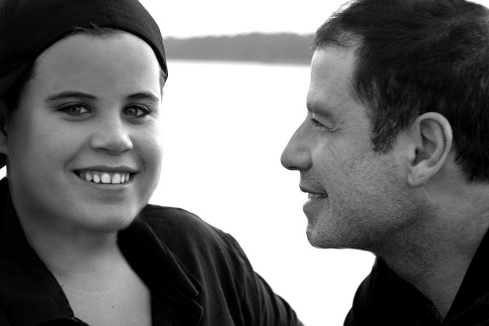 John Travolta ao lado do seu filho Jett | Reuters/Arquivo da Família Travolta