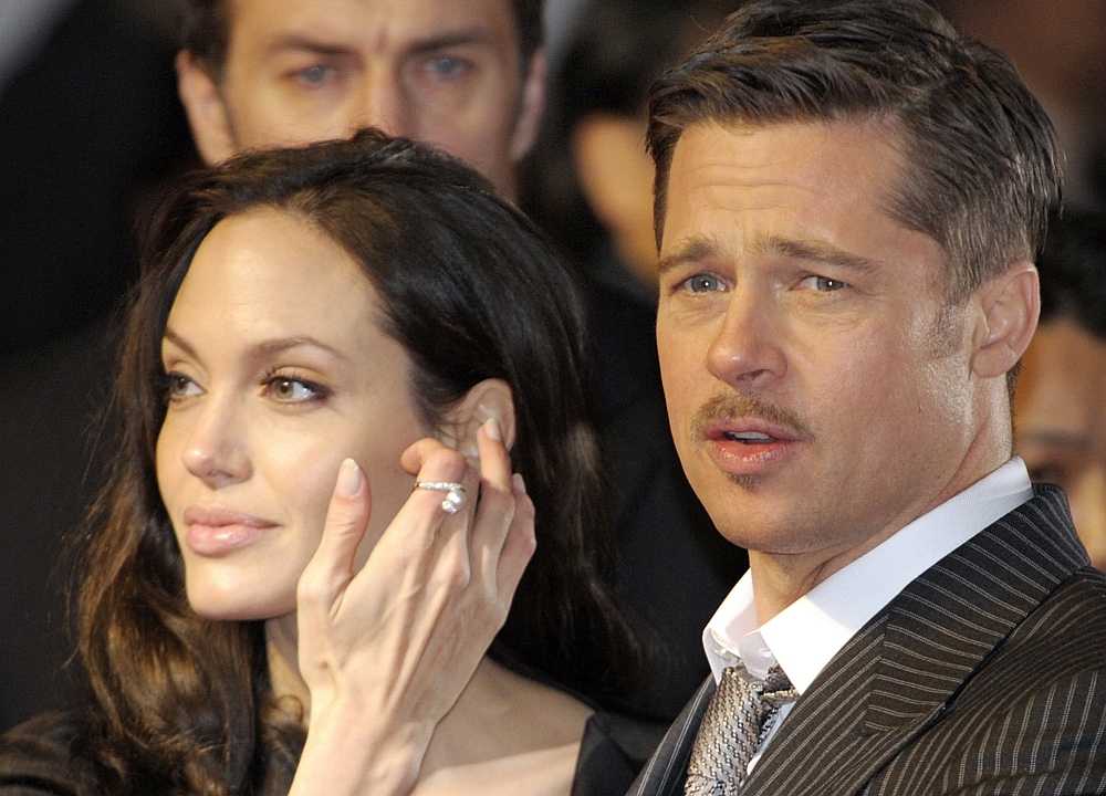 Brad Pitt e Angelina Jolie na premiere japonesa do filme "O Curioso Caso de Benjamin Button" | AFP/Toshifumi Kitamura
