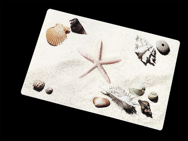 Jogo americano com desenhos de praia, da Kapazi. Preço sugerido: Linha Deluxe R$3,50 cada. | 