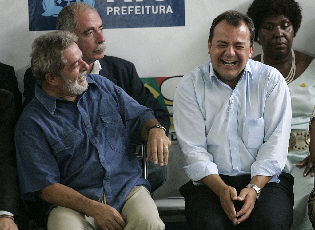 Lula e o governador do Rio de Janeiro, Sérgio Cabral: problemas na economia deverão persistir até o mês de março | Bruno Domingos/Reuters