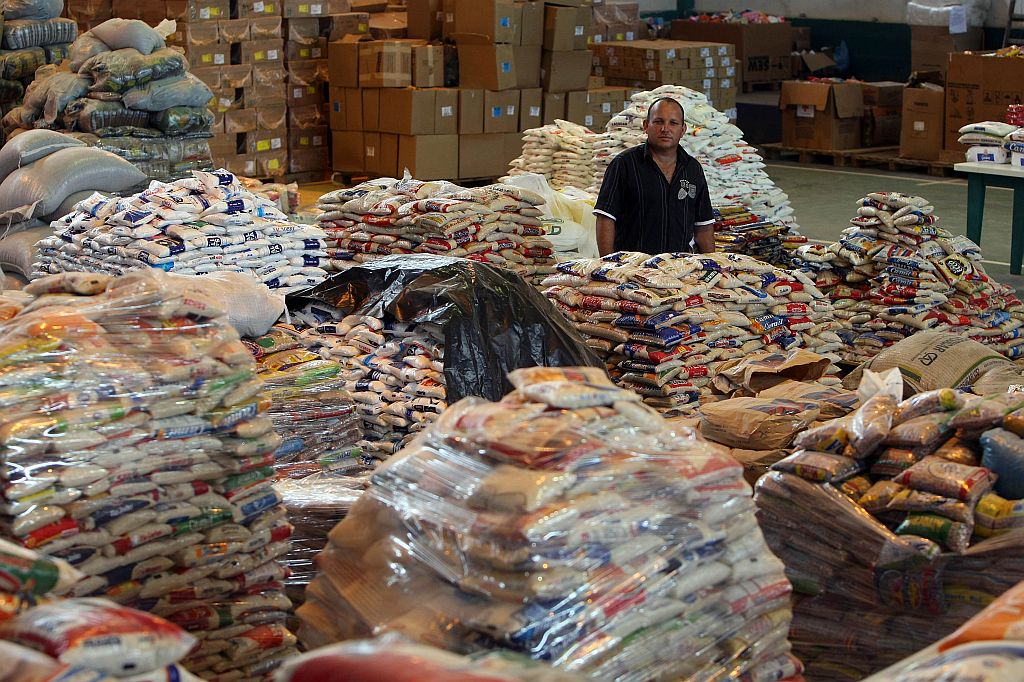 Ivanor Januário: depósitos ainda têm alimentos estocados, mas a maioria dos produtos já foi distribuída | Hedeson Alves/Gazeta do Povo