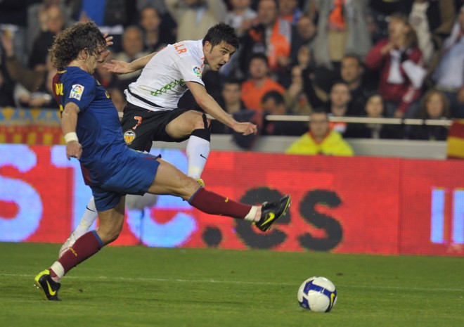 Jogo eletrizante entre Barcelona e Valencia contou com virada e empate no final | Diego Tuson / AFP