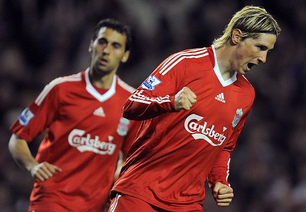 Fernando Torres marcou dois dos gols do Liverpool no empate histórico contra o Arsenal | Andrew Yates / AFP