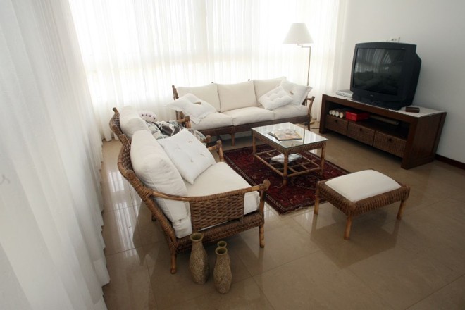 A sala de estar íntima pode ser transformada em quarto futuramente |