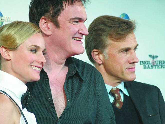 A atriz alemã Diane Kruger, Quentin Tarantino e Cristoph Waltz, em Cannes |