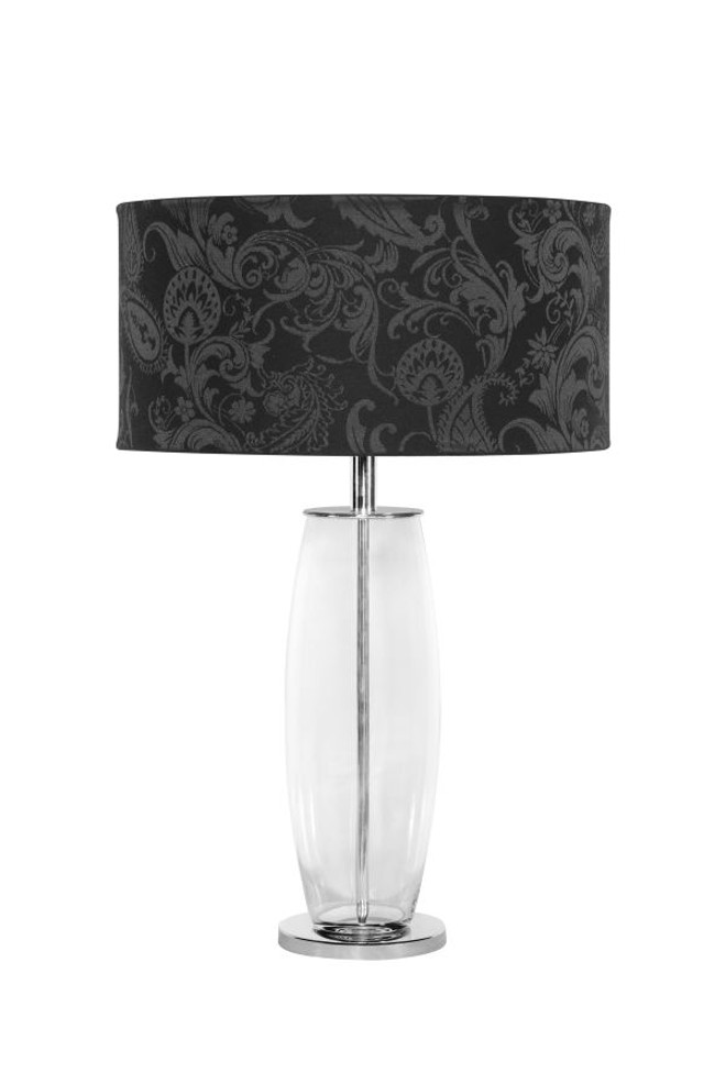 Peça com base em vidro alongado e cúpula em seda estampada em tom sobre tom. Preço R$ 781. À venda na Studio Casa |