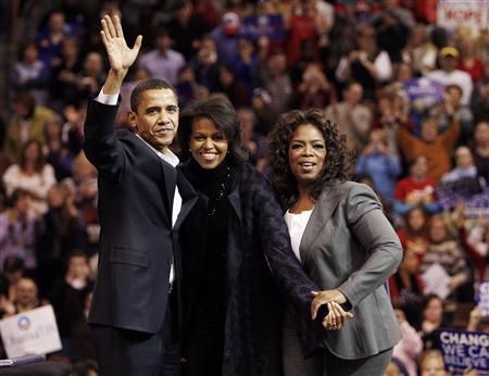 A apresentadora Oprah e o casal Obama | Reuters
