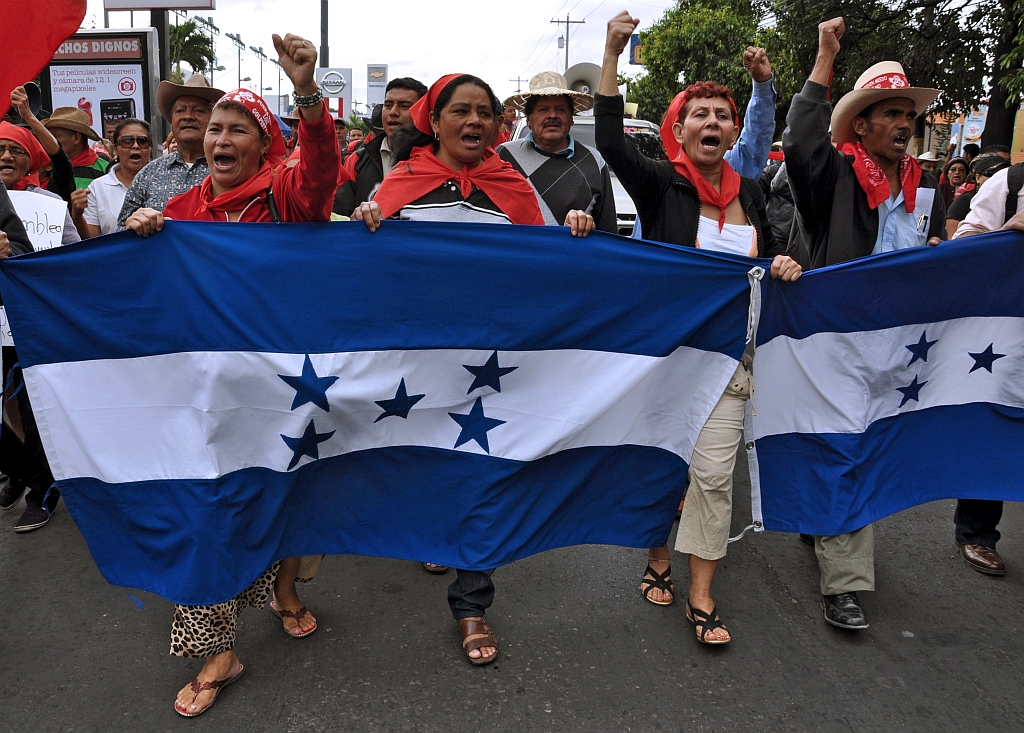 Apoiadores de Manuel Zelaya: recusa à anistia de Micheletti | Claudia Barrientos/AFP