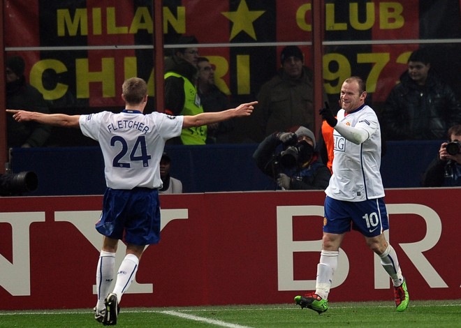 Rooney brilhou e com dois gols decretou a vitória do Manchester sobre o Milan | 