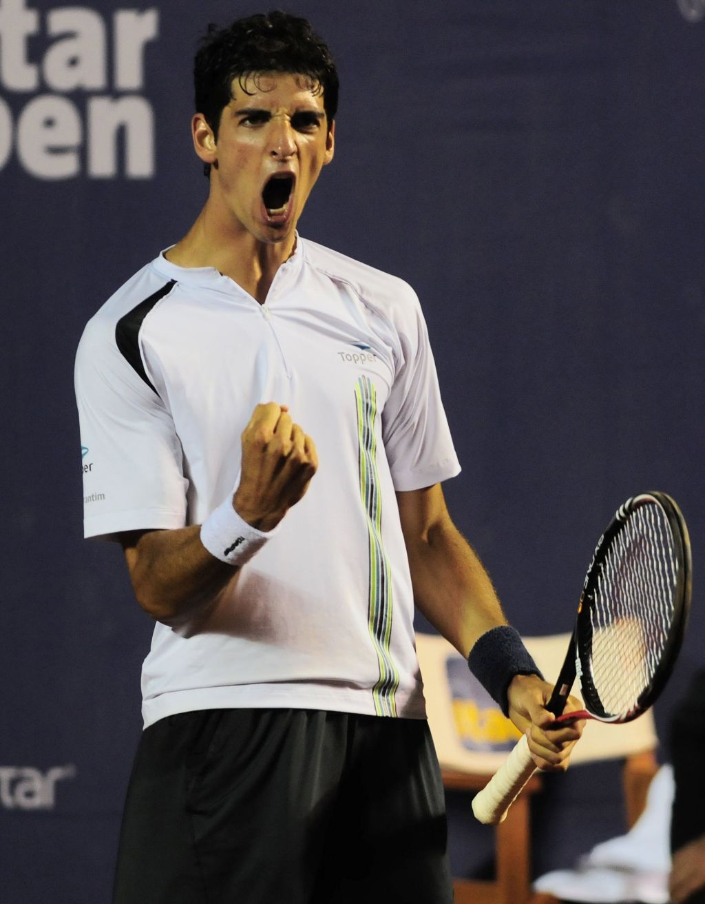 Thomaz Bellucci comemora o ponto final contra Monaco: melhor colocação da carreira | Claudio Santana/AFP