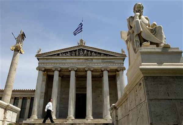 Alemanha e França prometem endurecer com a Grécia em troca de apoio financeiro | Reuters