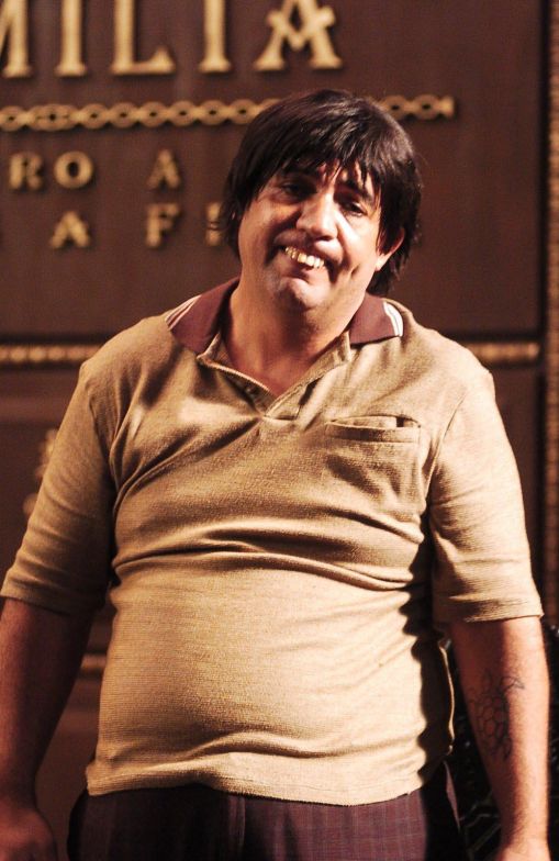 Bussunda, interpretando Lindauro, em cena do filme Seus Problemas Acabaram | Divulgação