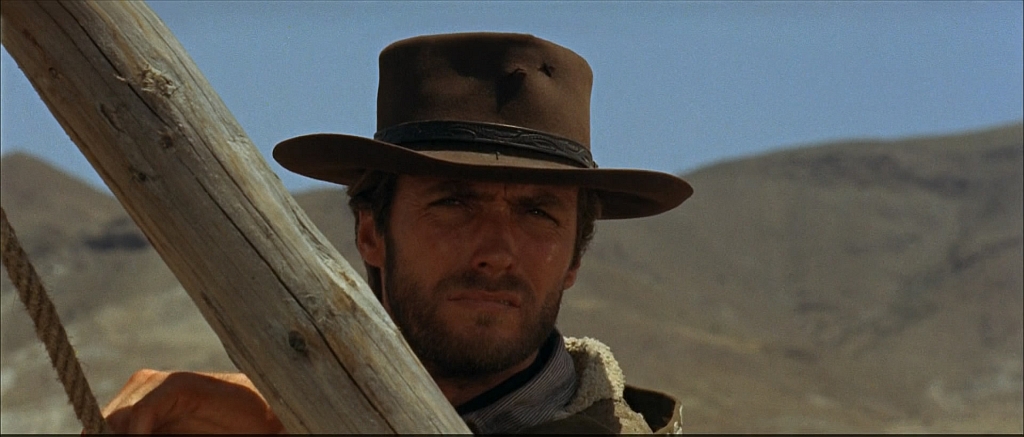 O icônico homem sem nome que surge pela primeira vez em Por um Punhado de Dólares (1964) | Divulgação