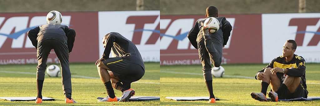 Robinho faz malabarismo com a bola sob o olhar do atacante Luís Fabiano | Valterci Santos/ Gazeta do Povo enviado especial