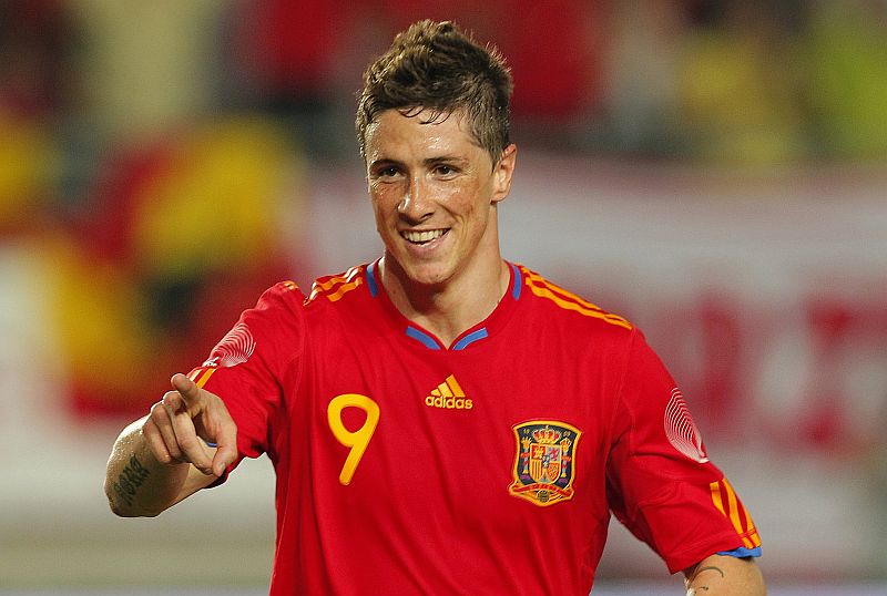 Voltando de lesão, Fernando Torres comemora um gol no massacre espanhol sobre a Polônia | José Jordan / AFP
