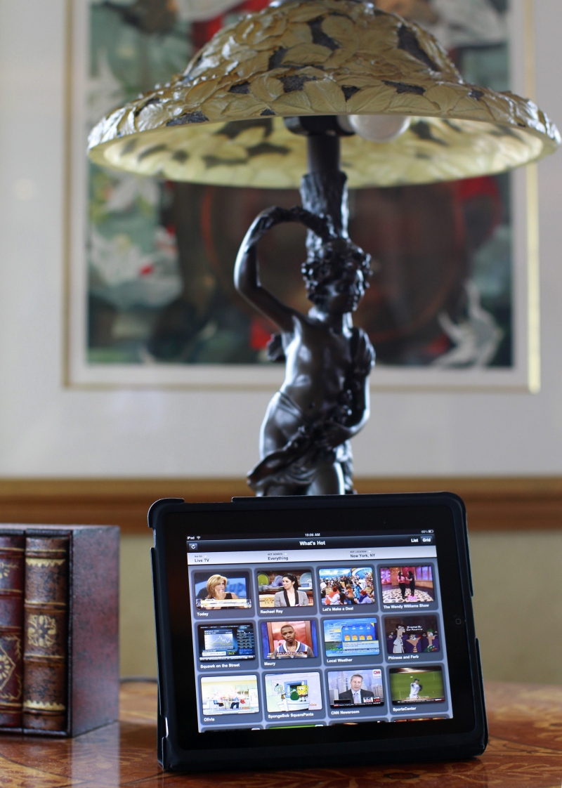 iPad apresenta mosaico com programação de tevê, n um aplicativo da Verizon | Brendan McDermid/Reuters