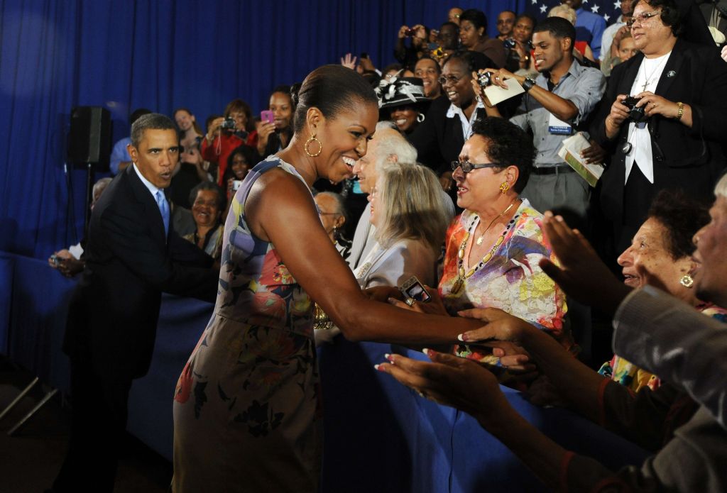 Obama e Michelle cumprimentaram o público na cerimônia em Nova Orleans | Jewel Samad/AFP