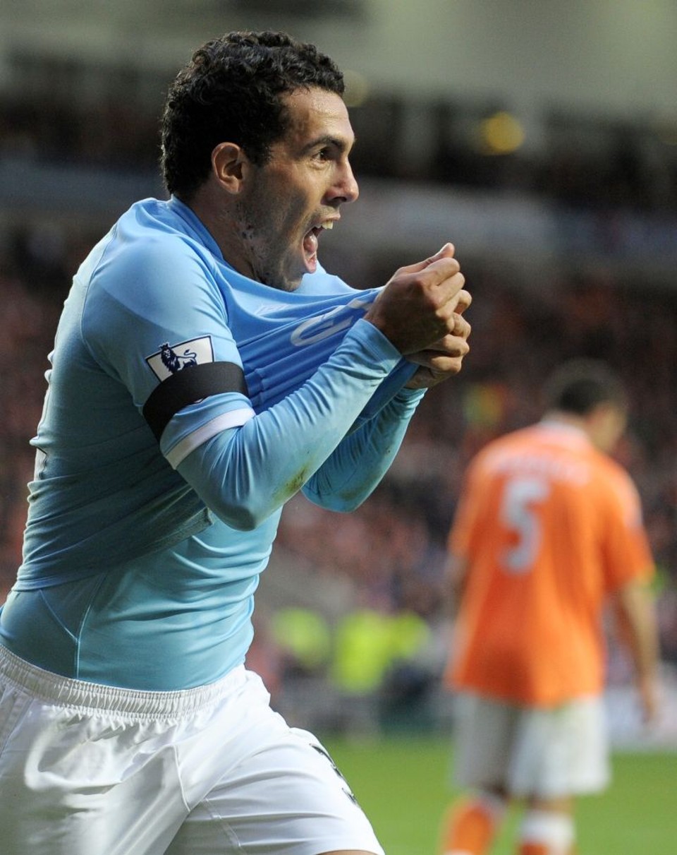 Tevez faz dois gols e City vence | Andrew Yates/AFP