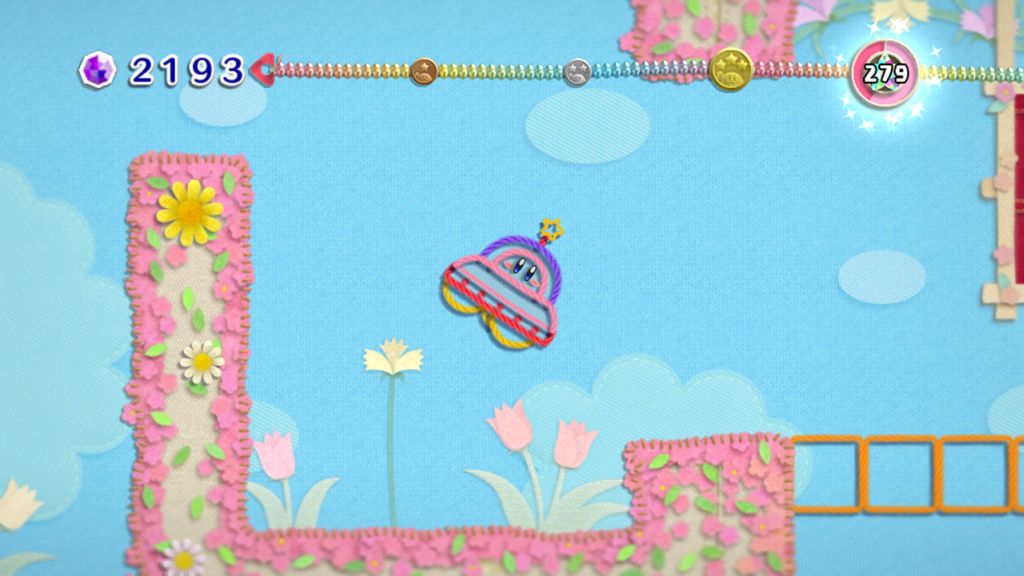 Screenshot da nova aventura de Kirby: direção de arte parece ter se inspirado em trabalhos escolares de educação artística | Divulgação/Nintendo