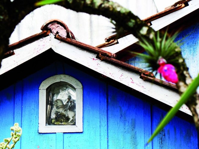 Imagem de São Jorge em residência do bairro Santa Cândida | 