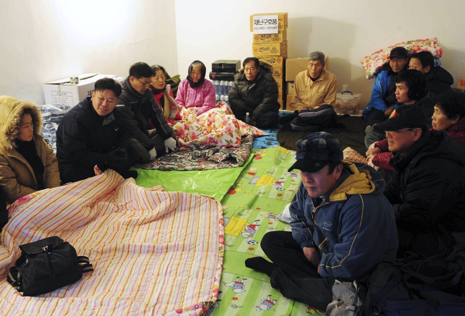 Moradores da área de fronteira foram encaminhados para abrigos subterrâneos | REUTERS/Newsis/Korea Pool