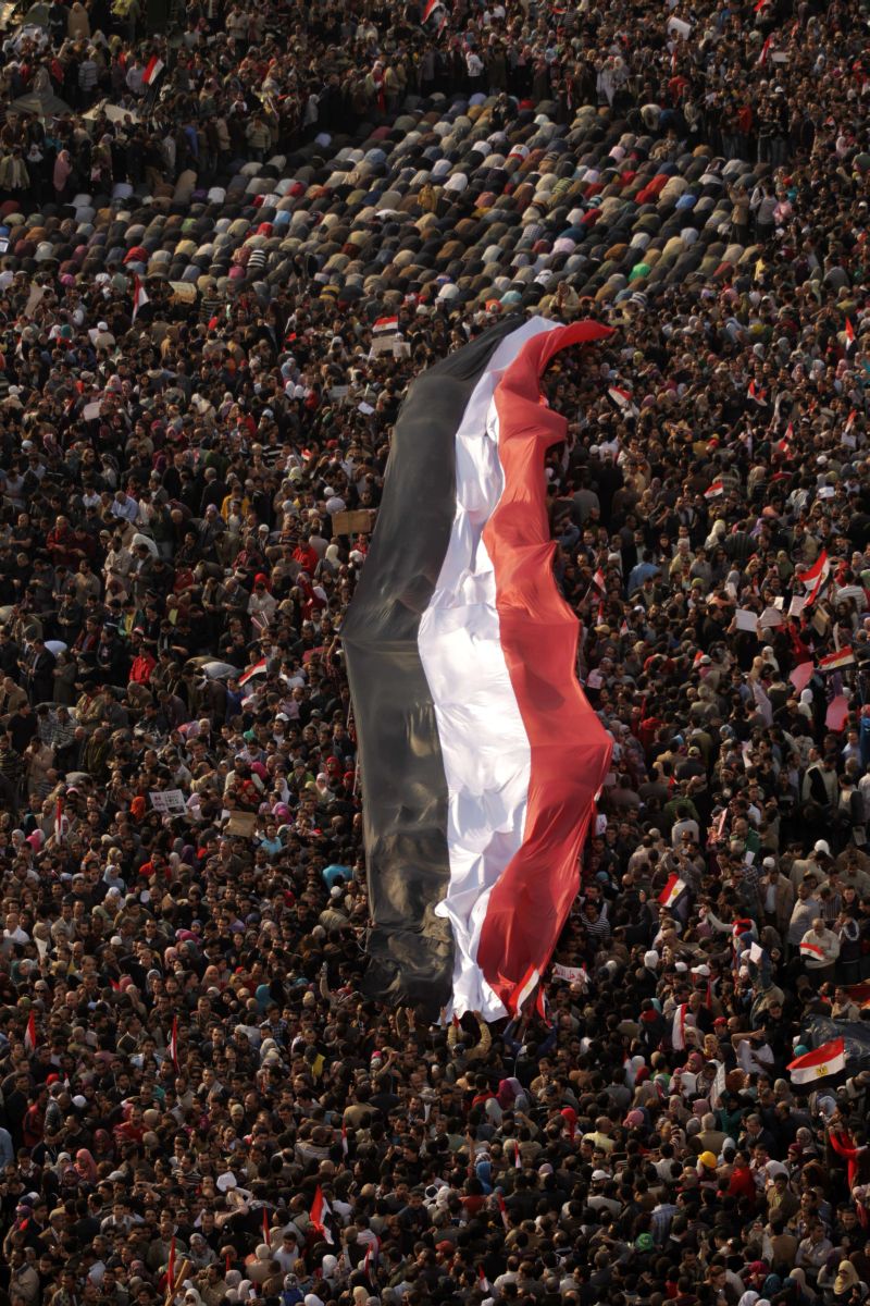 Manifestantes concentrados na Praça Tahrir, centro do levante contra o governo | Patrick Baz / AFP