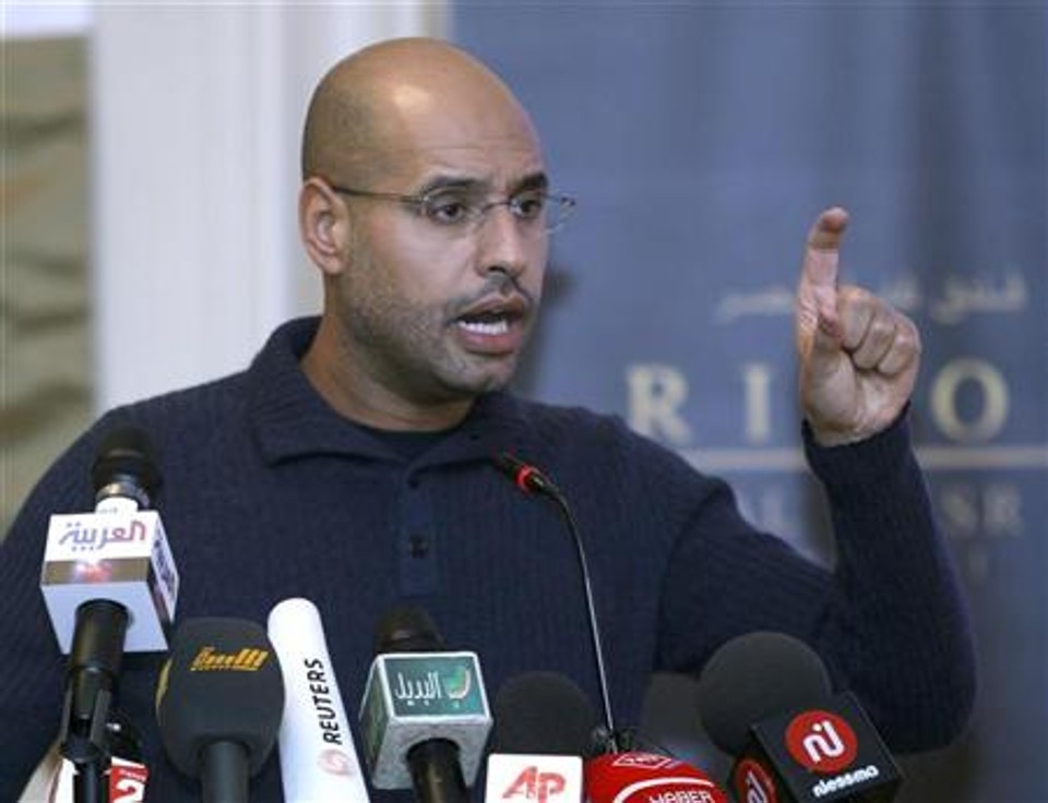Saif al-Islam Kadafi, filho do líder líbio Muamar Kadafi, durante entrevista à imprensa em Trípoli | Reuters