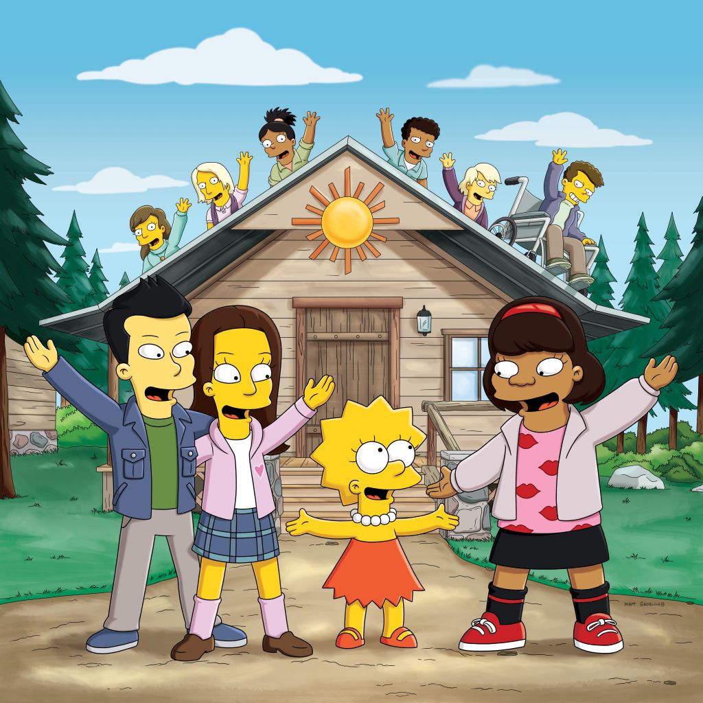 Lisa, de vestido alaranjado, encontra os personagens da série Glee | Divulgação