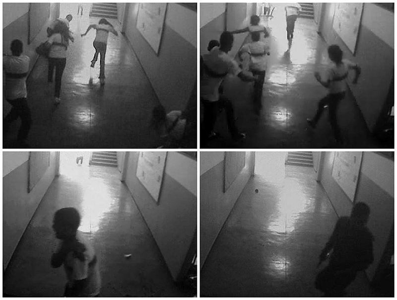 Flagrante da chacina -Câmeras do circuito interno da Escola Municipal Tasso da Silveira registraram a ação do atirador Wellington Menezes de Oliveira, o pânico dos estudantes em fuga e a chegada do policial que evitou uma tragédia ainda maior em Realengo. Toda a ação durou cerca de 15 minutos | Reuters