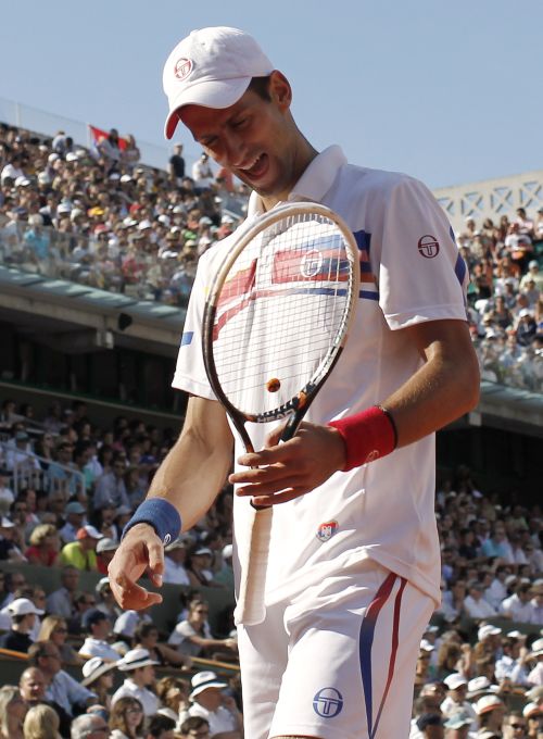 O sérvio Djokovic está a um triunfo do recorde de John McEnroe, de 1984 | Thomas Coex / AFP