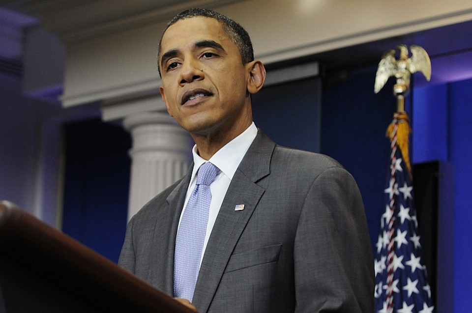 "Quero anunciar que os líderes dos dois partidos alcançaram um acordo que vai cortar gastos e evitar um default (termo técnico para o calote)", disse o presidente Obama em rápido pronunciamento neste domingo | Jona Than Ernst/Reuters