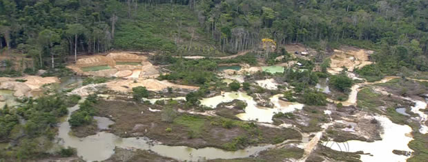 Cerca de 100 garimpeiros exploravam garimpo Novo Astro quando operação foi deflagrada no local | Reprodução/TVCA