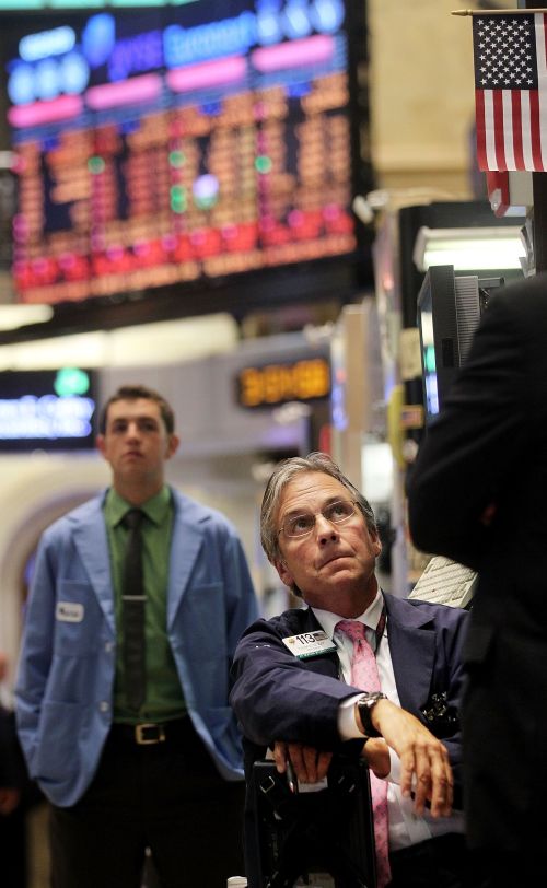 Operadores da Bolsa de Nova York: fuga de ativos de risco provocou a maior desvalorização desde 2008 | Mario Tama/AFP