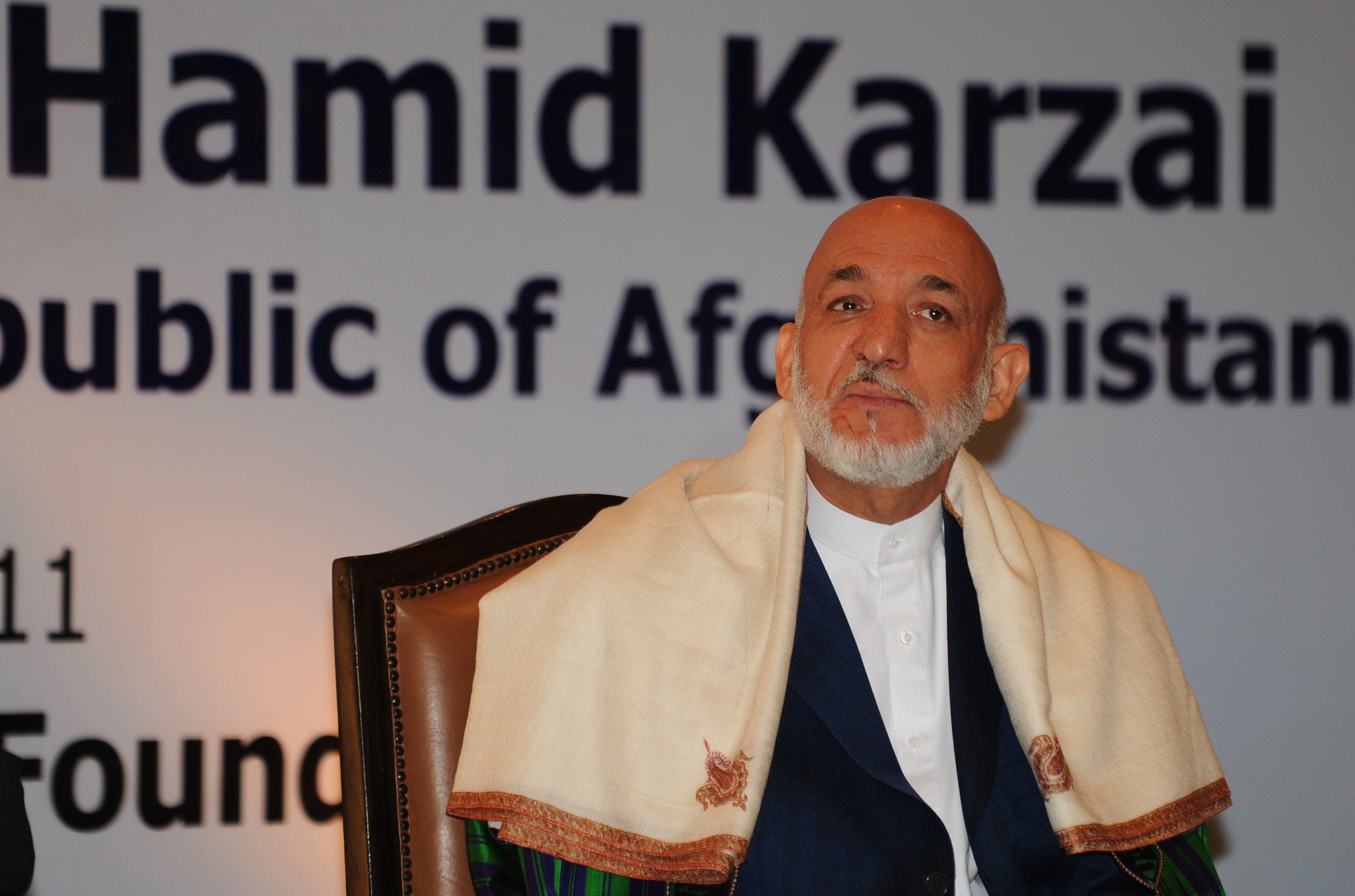 Presidente afegão Hamid Karzai fala em Nova Déhli, Índia | AFP PHOTO/ RAVEENDRAN