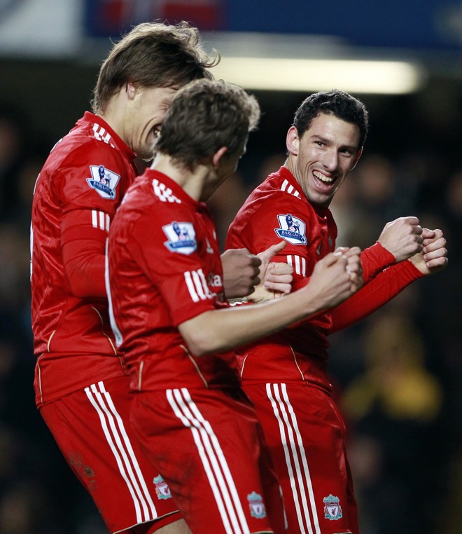 Jogadores do Liverpool comemoram triunfo sobre o Chelsea |
