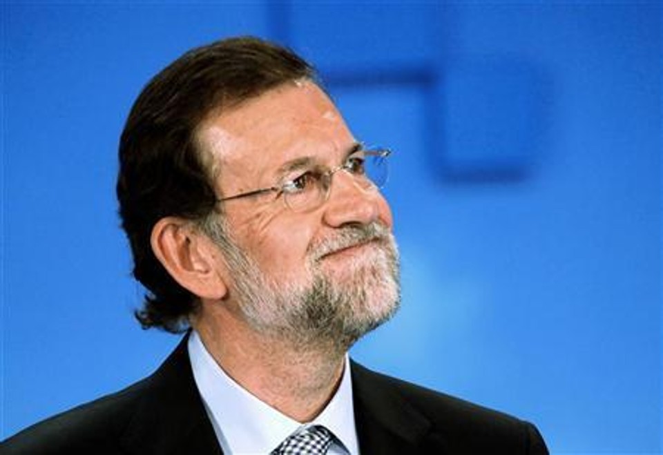 Líder do Partido Popular da Espanha, Mariano Rajoy, reage durante campanha em Santander | REUTERS/Nacho Cubero