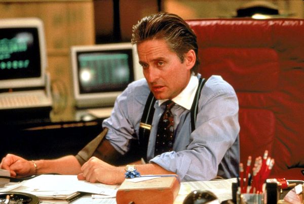 Michael Douglas interpreta Gordon Gekko no filme Wall Street Poder e Cobiça (1987) | Divulgação