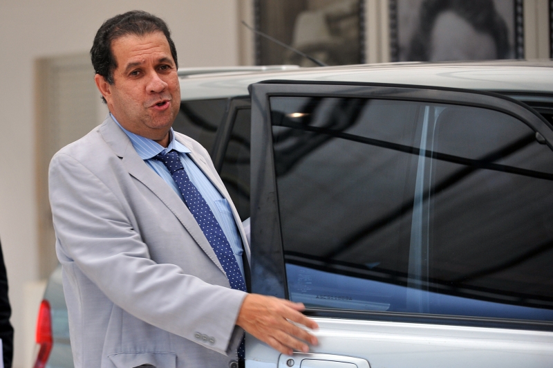 O ex-ministro do Trabalho, Carlos Lupi, deixa a sede de seu partido, o PDT, onde participou de reuniões durante todo do dia | Fabio Rodrigues Pozzebom/ABr