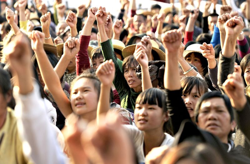 Moradores da província de Guangdong participam de protesto | AFP