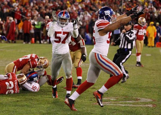Jogadores do Giants comemoram lance decisivo da partida | 