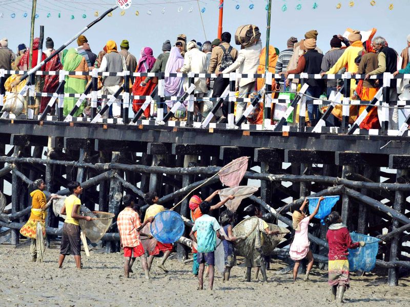 Metade dos
1,2 bilhão de habitantes da Índia tem 25 anos ou menos e os níveis de escolaridade são preocupantes | Dibyangshu Sarkar/AFP