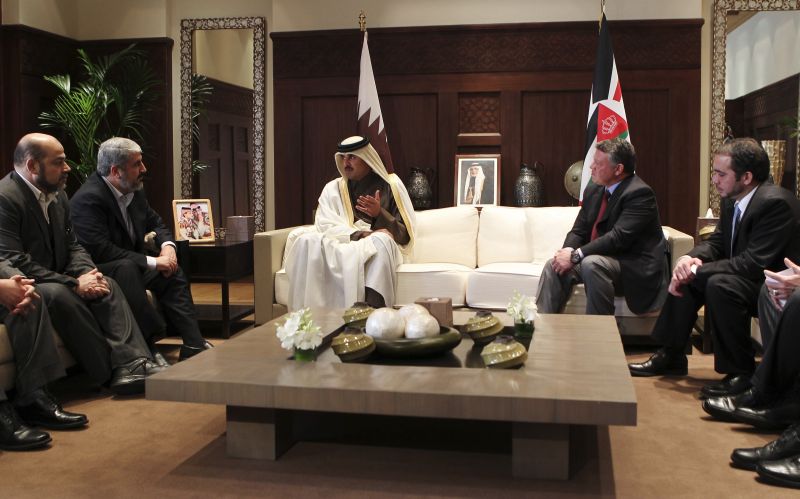 Líder do grupo islamita palestino Hamas e rei Abdullah II | REUTERS/Ali Jarekji